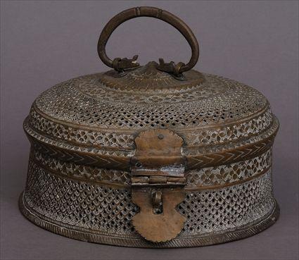 Appraisal: INDIAN PIERCED BRASS COVERED BOX The round box with hinged