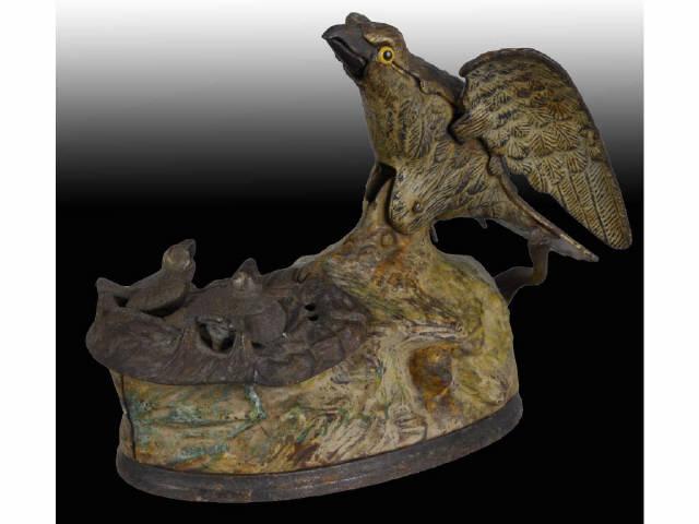 Appraisal: Cast Iron Eagle Eaglets Mechanical Bank Description All original Replaced