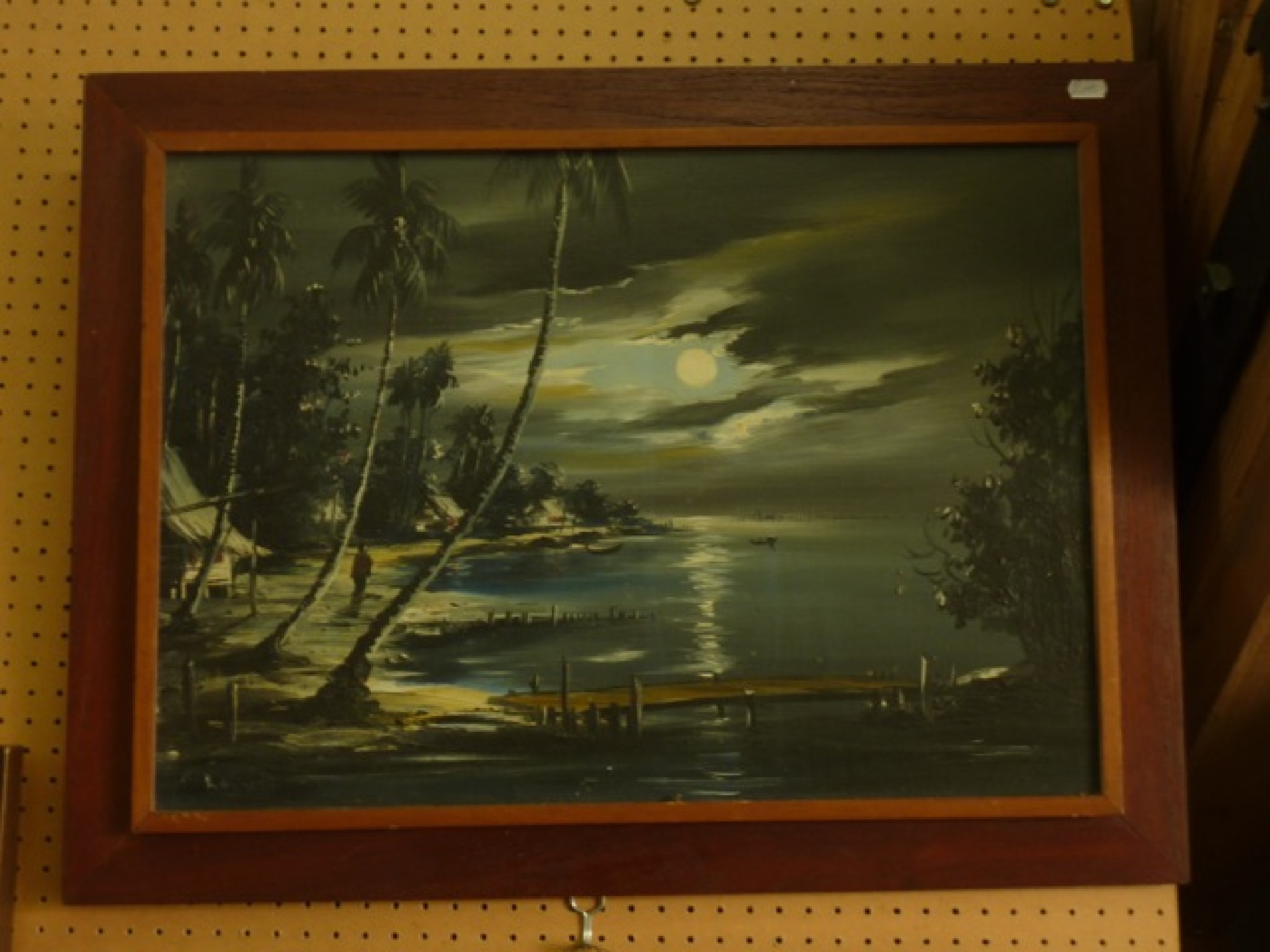 Appraisal: An oil painting on canvas of a tropical shore scene