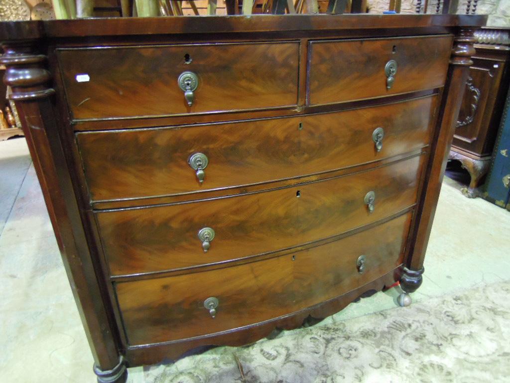 Appraisal: A Victorian mahogany bow fronted chest fitted with an arrangement