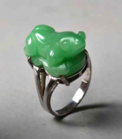 Appraisal: Chinese Carved Jadeite Mounted Silver RingDepicting a frog ring size