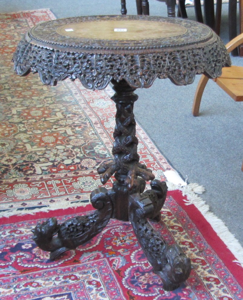 Appraisal: A th century Anglo Indian carved hardwood oval occasional table