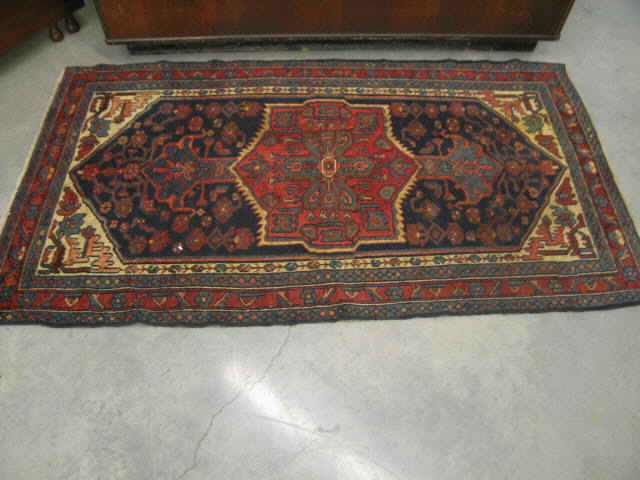 Appraisal: Hamadan Persian Handmade Rug large central medallion deep colors primarily