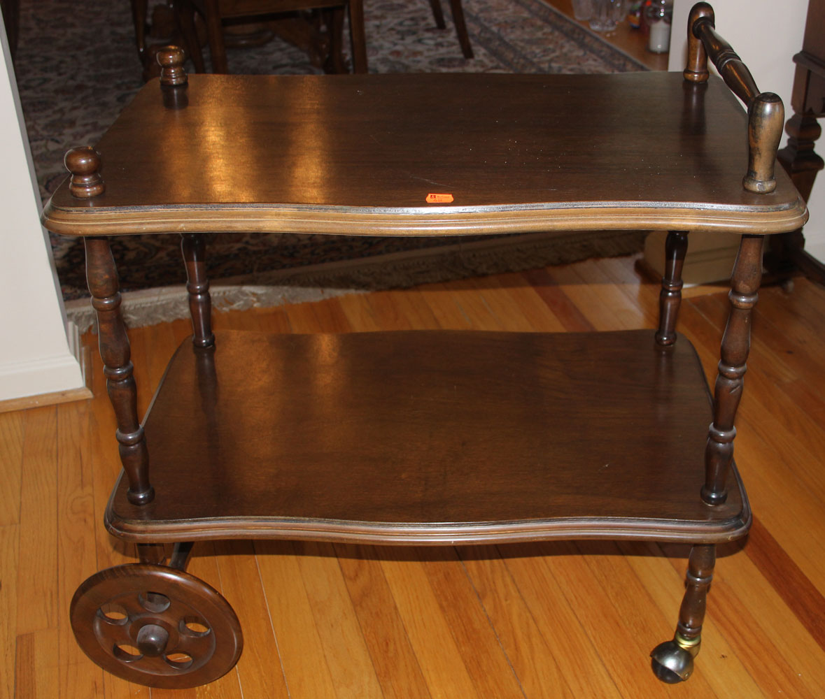 Appraisal: Turned wood tea cart