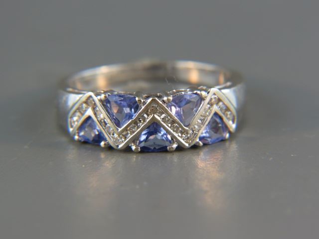 Appraisal: Tanzanite and Diamond Ring rich triangular gems and round diamonds