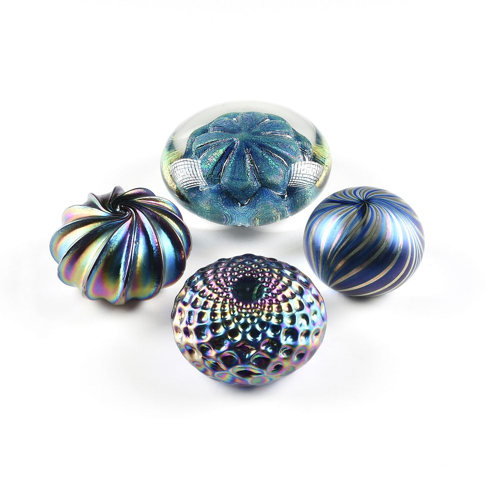 Appraisal: A GROUP OF FOUR BLUE IRIDESCENT ART GLASS PAPERWEIGHTS MODERN