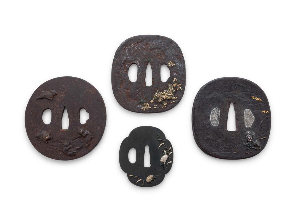 Appraisal: Four Inlaid Tsuba Four Inlaid Tsuba comprising an inlaid bronze