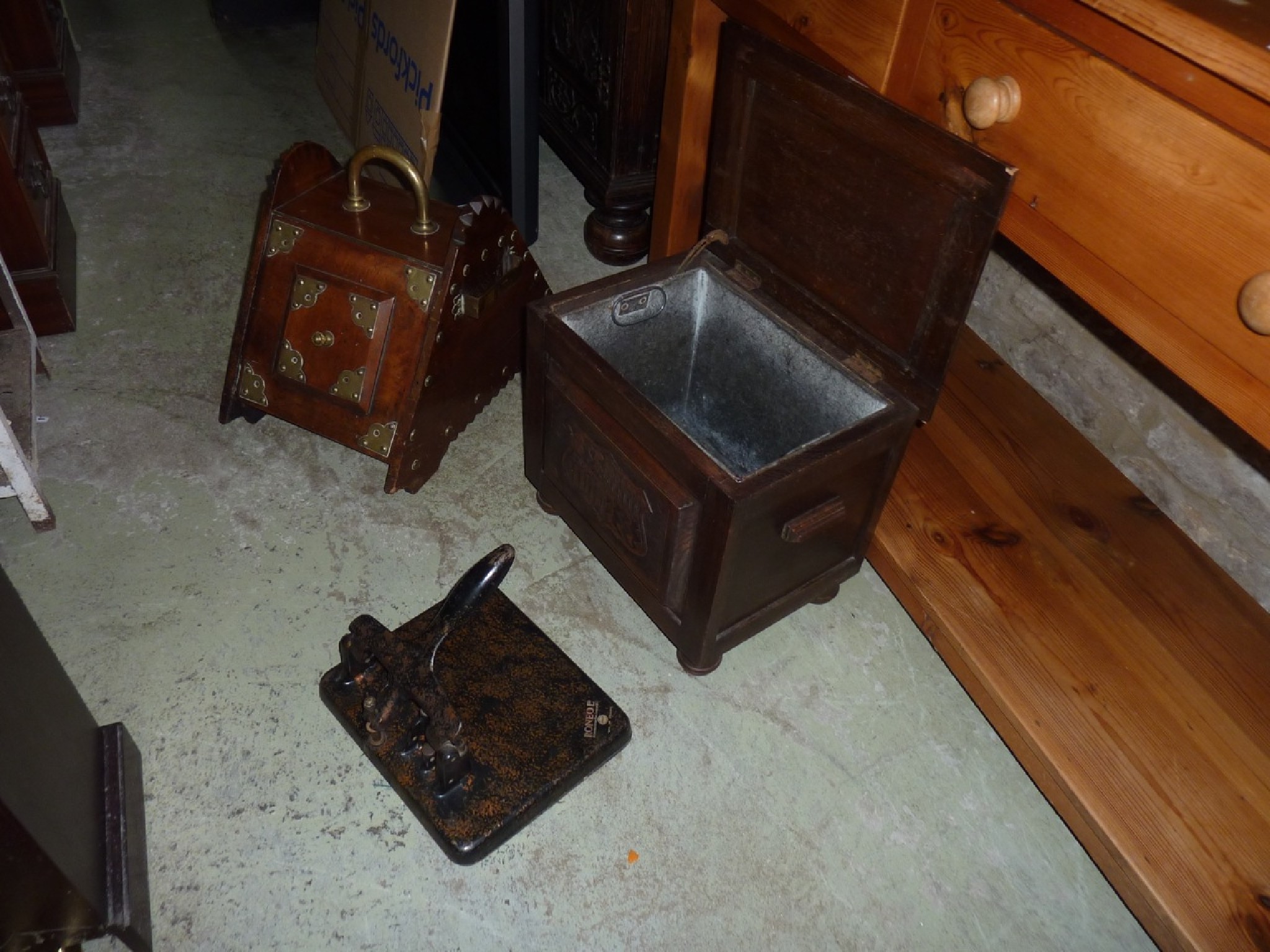 Appraisal: A late Victorian walnut coal scuttle with applied brass fittings