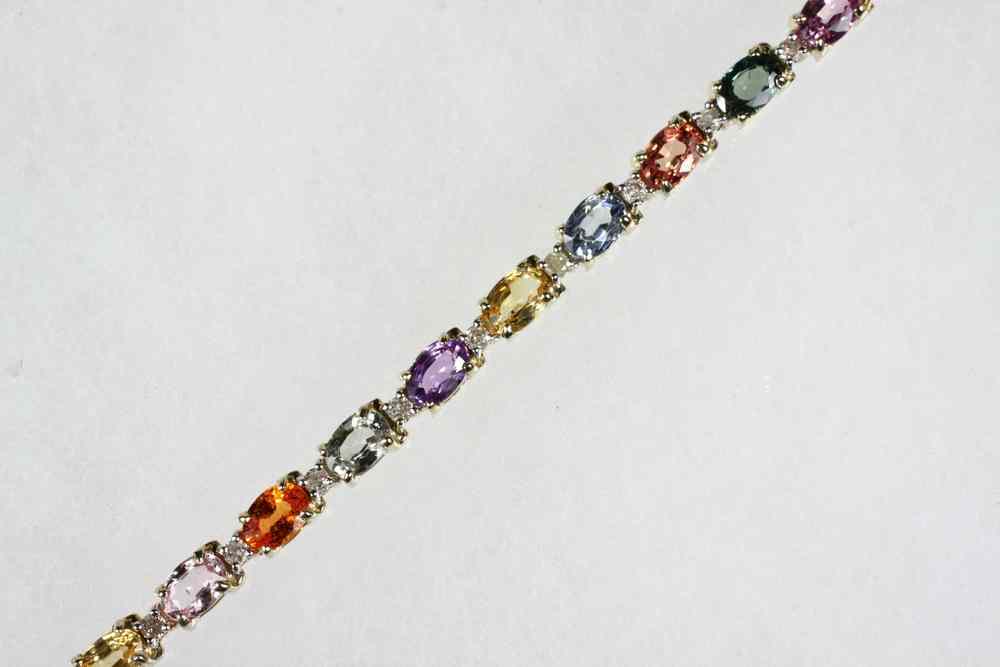 Appraisal: BRACELET - K yellow gold and multi-colored oval sapphire and