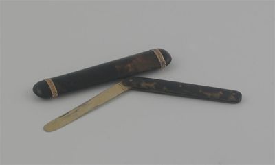 Appraisal: A silvergilt mounted folding fruit knife in a tortoiseshell coppergilt