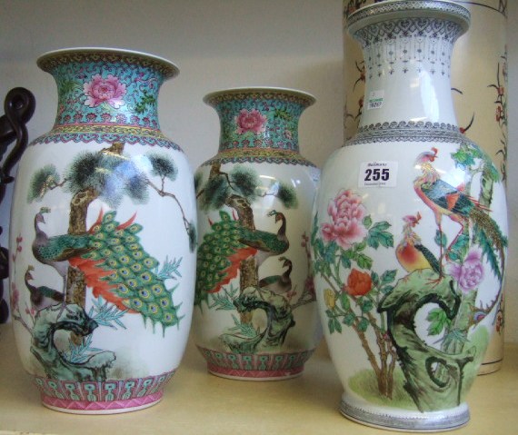 Appraisal: Three modern Chinese vases of baluster form decorated with peacocks