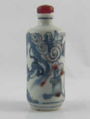 Appraisal: Chinese ceramic snuff bottle painted with amusing tiger scene In