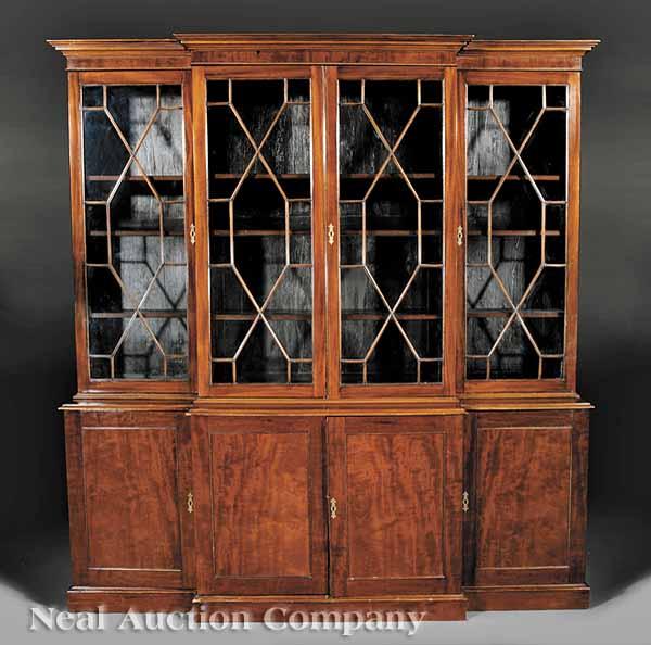 Appraisal: An Antique George III-Style Mahogany Breakfront Bookcase th c molded