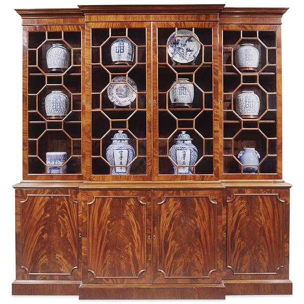 Appraisal: An imposing George III style mahogany breakfront bookcase cabinet height