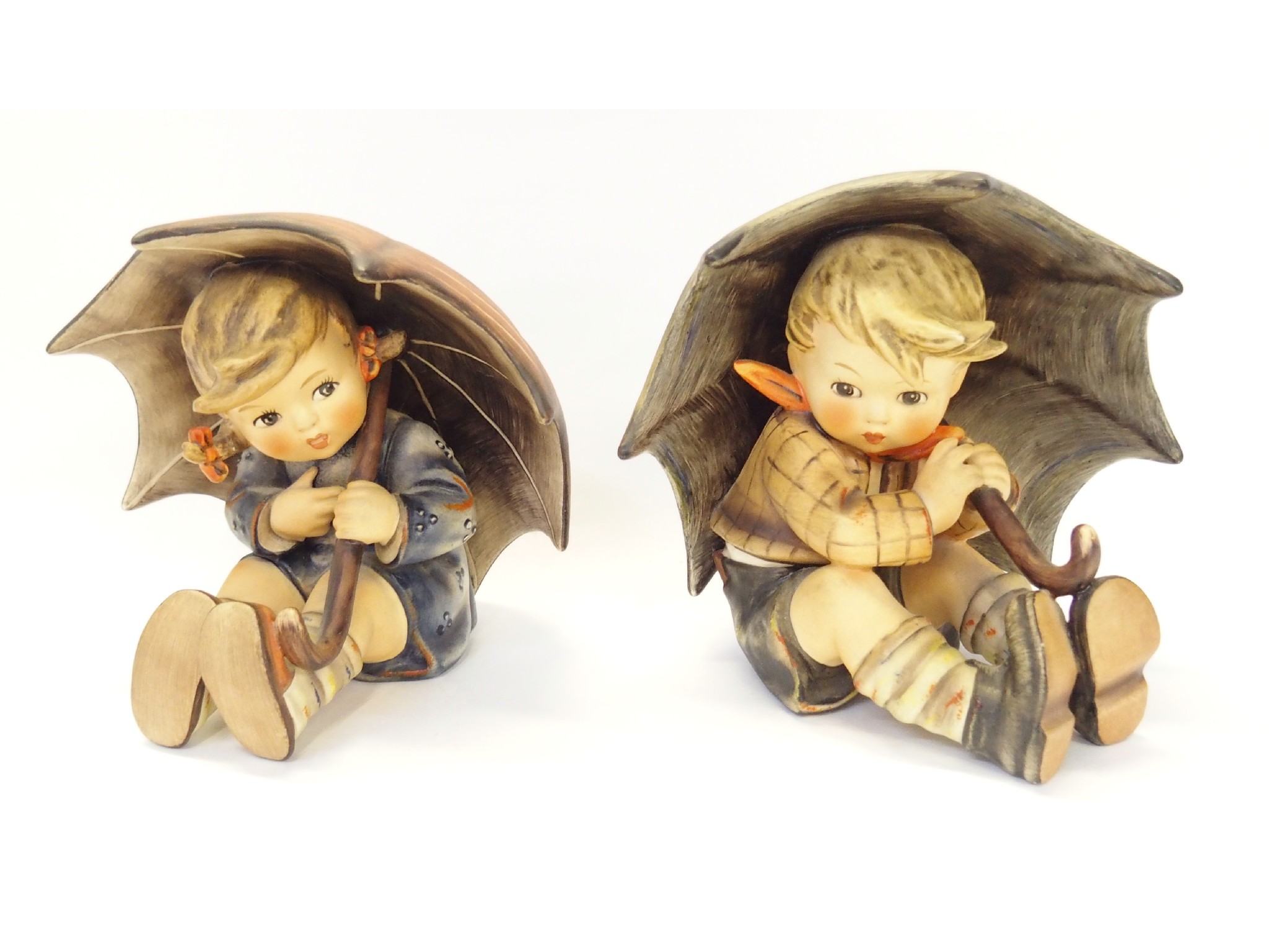 Appraisal: Two Hummel figures Umbrella Boy and Umbrella Girl