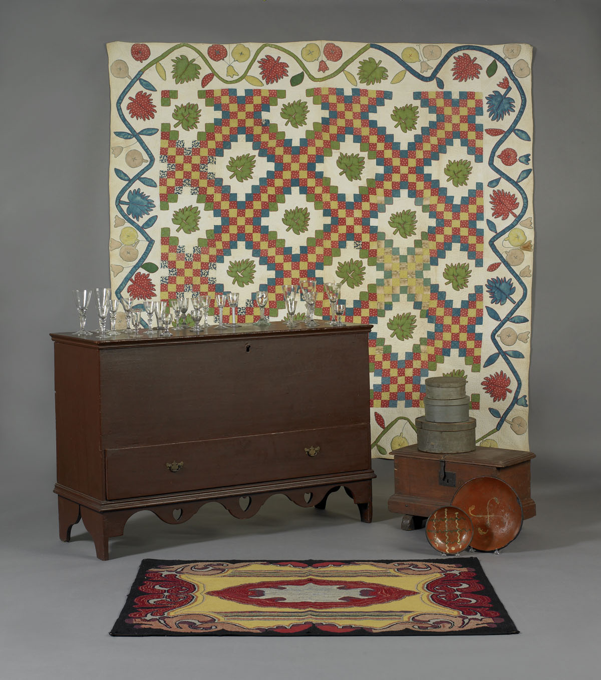 Appraisal: HOOKED RUG WITH CENTRAL MEDALLION Worked in red mustard and