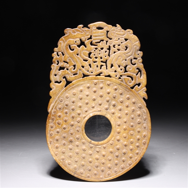 Appraisal: Chinese archaistic carved hardstone bi with elaborate openwork overall good