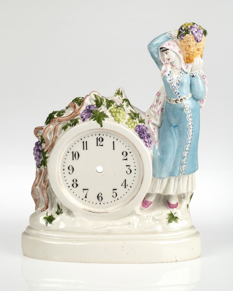 Appraisal: A RUSSIAN PORCELAIN TABLE CLOCK CASE IN THE SHAPE OF