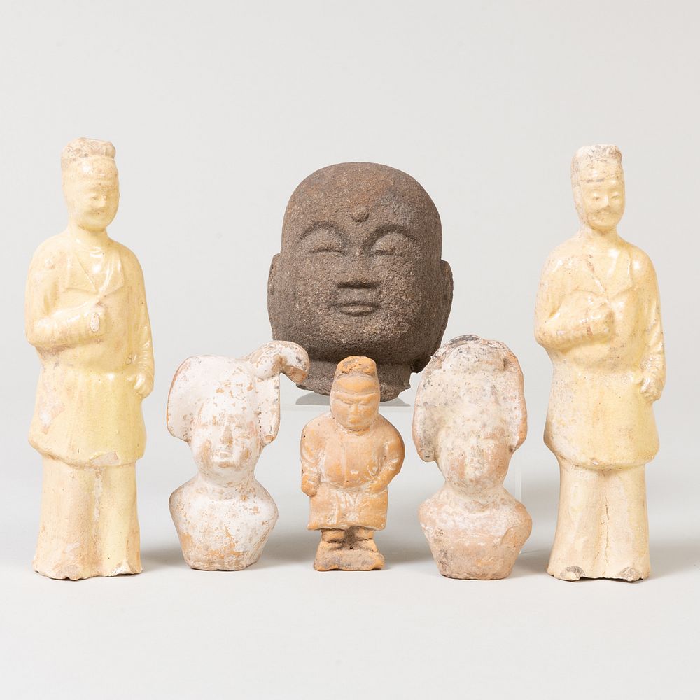 Appraisal: Group of Chinese Pottery Figures and a Carved Stone Head