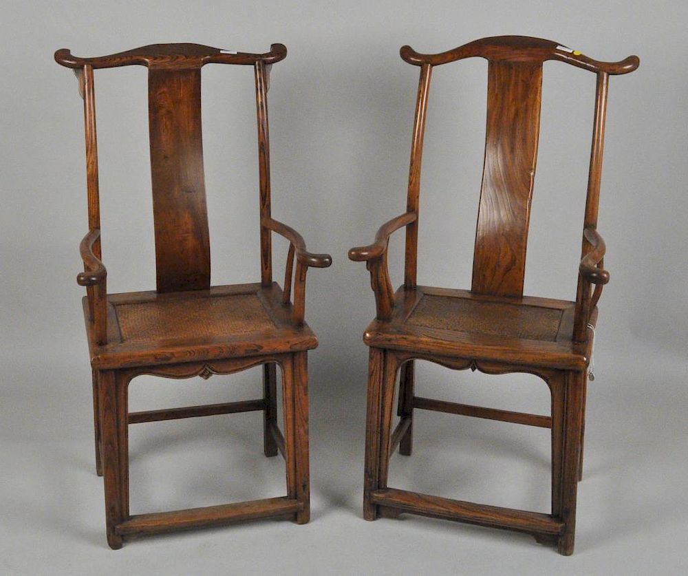 Appraisal: Pair Chinese Elm Yoke Back Arm Chairs with woven cane