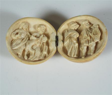 Appraisal: A th century carved ivory ball the hinged exterior decorated