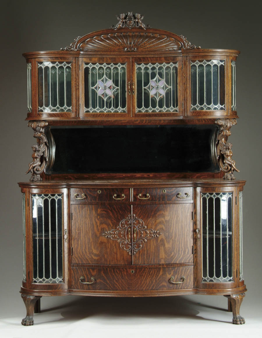 Appraisal: OUTSTANDING LEADED GLASS CARVED OAK MIRRORED SIDEBOARD Quartered oak throughout