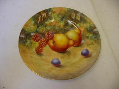 Appraisal: A ROYAL WORCESTER PORCELAIN PLATE painted with pears and raspberries