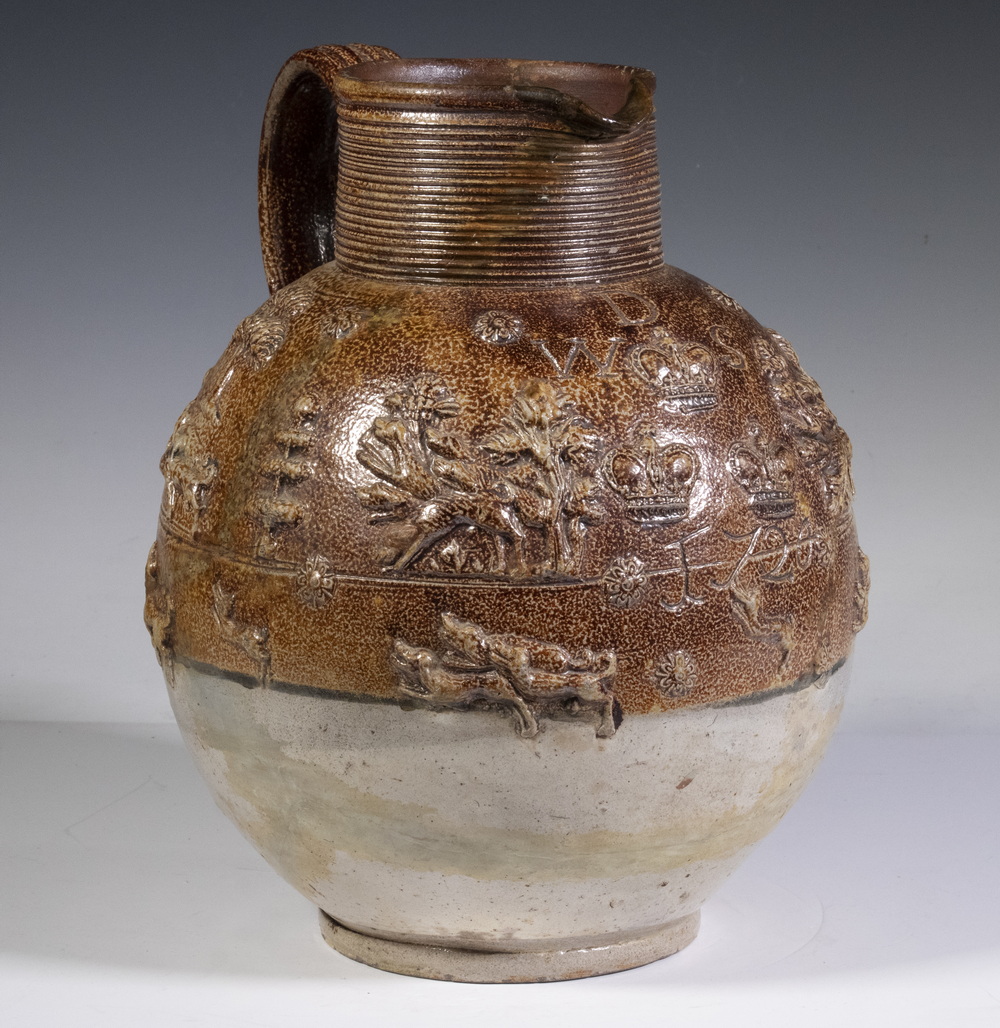 Appraisal: ENGLISH TH C SALT GLAZED POTTERY JUG Two-Tone Bulbous Relief