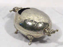 Appraisal: An enclosed ovoid silver plated spoon warmer on four hoofed