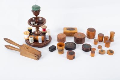 Appraisal: A collection of treen including cotton reel bobbin stand cm