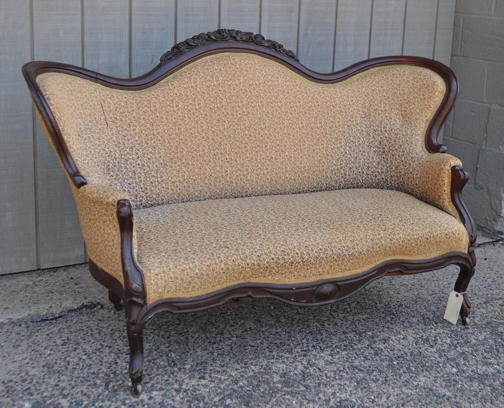 Appraisal: Victorian Carved Walnut Parlor Sofa with fruit floral carved crest