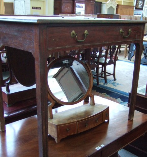 Appraisal: A George III mahogany side table the rectangular top inset