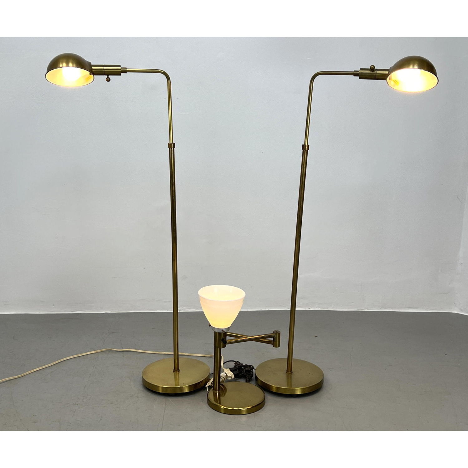 Appraisal: Modernist Brass Lamps Some marked CHAPMAN Tall lamps have adjustable