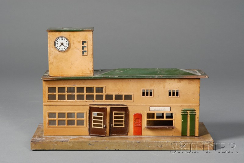 Appraisal: Marklin Painted Steel Railroad Station early th century mustard-yellow building