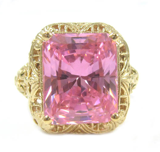 Appraisal: PINK CUBIC ZIRCONIA AND TEN KARAT GOLD RING The pieced