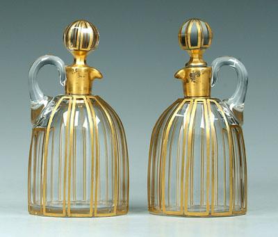 Appraisal: Two glass cruets shaped as hooped skirts with gilt decoration