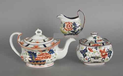 Appraisal: Gaudy Dutch teapot th c in the warbonnet pattern together