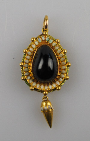 Appraisal: Etruscan style cabochon garnet and white enamelled pendant with drop