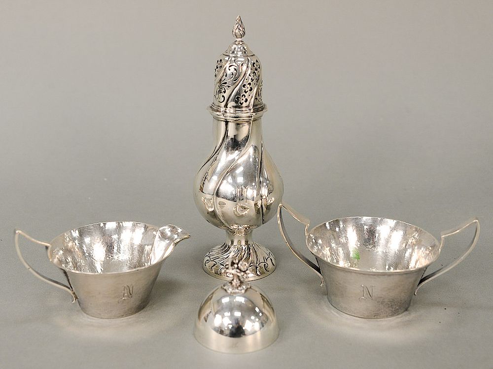 Appraisal: Four piece lot including Cartier sterling silver bell caster and