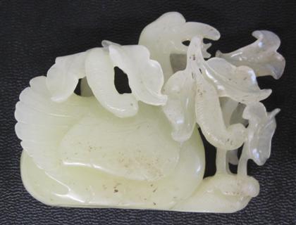 Appraisal: Chinese celadon jade duck carving The floating duck with detailed