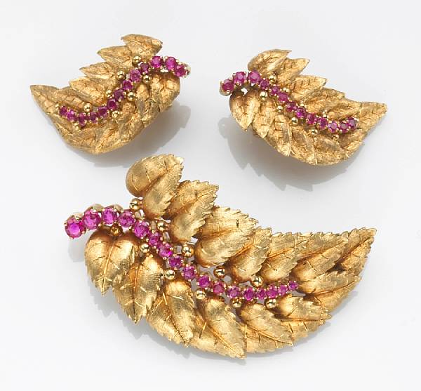 Appraisal: A ruby and k gold textured leaf brooch and matching