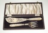 Appraisal: PAIR OF VICTORIAN SILVER AND MOTHER-OF-PEARL FISH SERVERS SHEFFIELD pierced