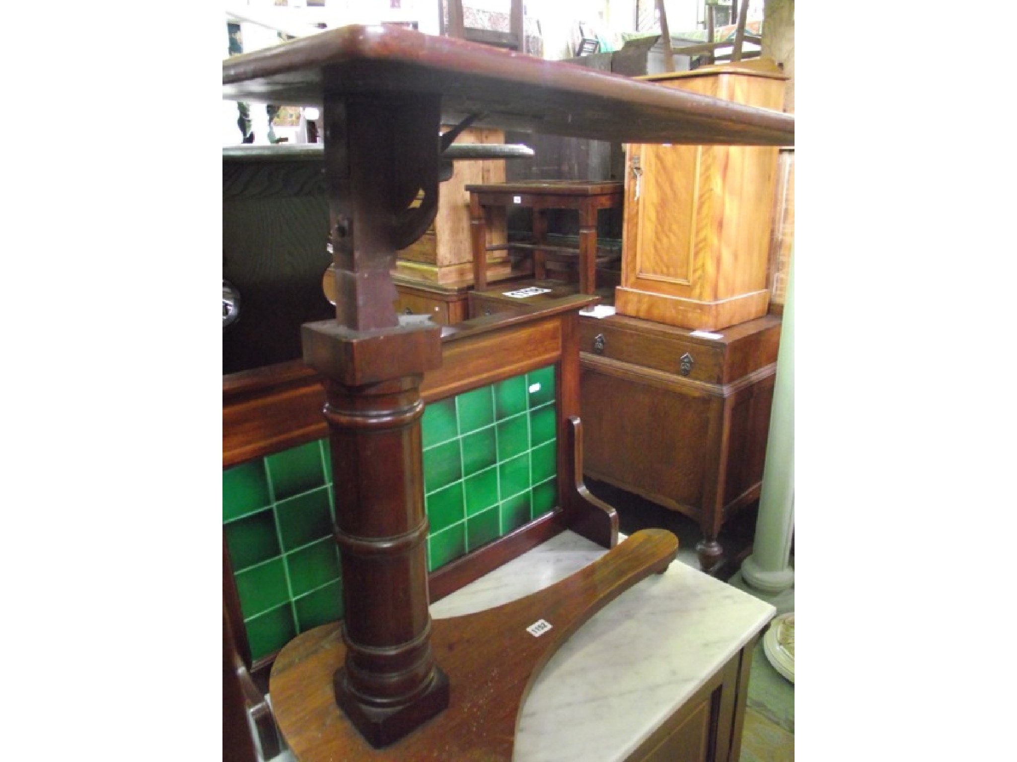 Appraisal: A Victorian mahogany reading table the adjustable rectangular top with