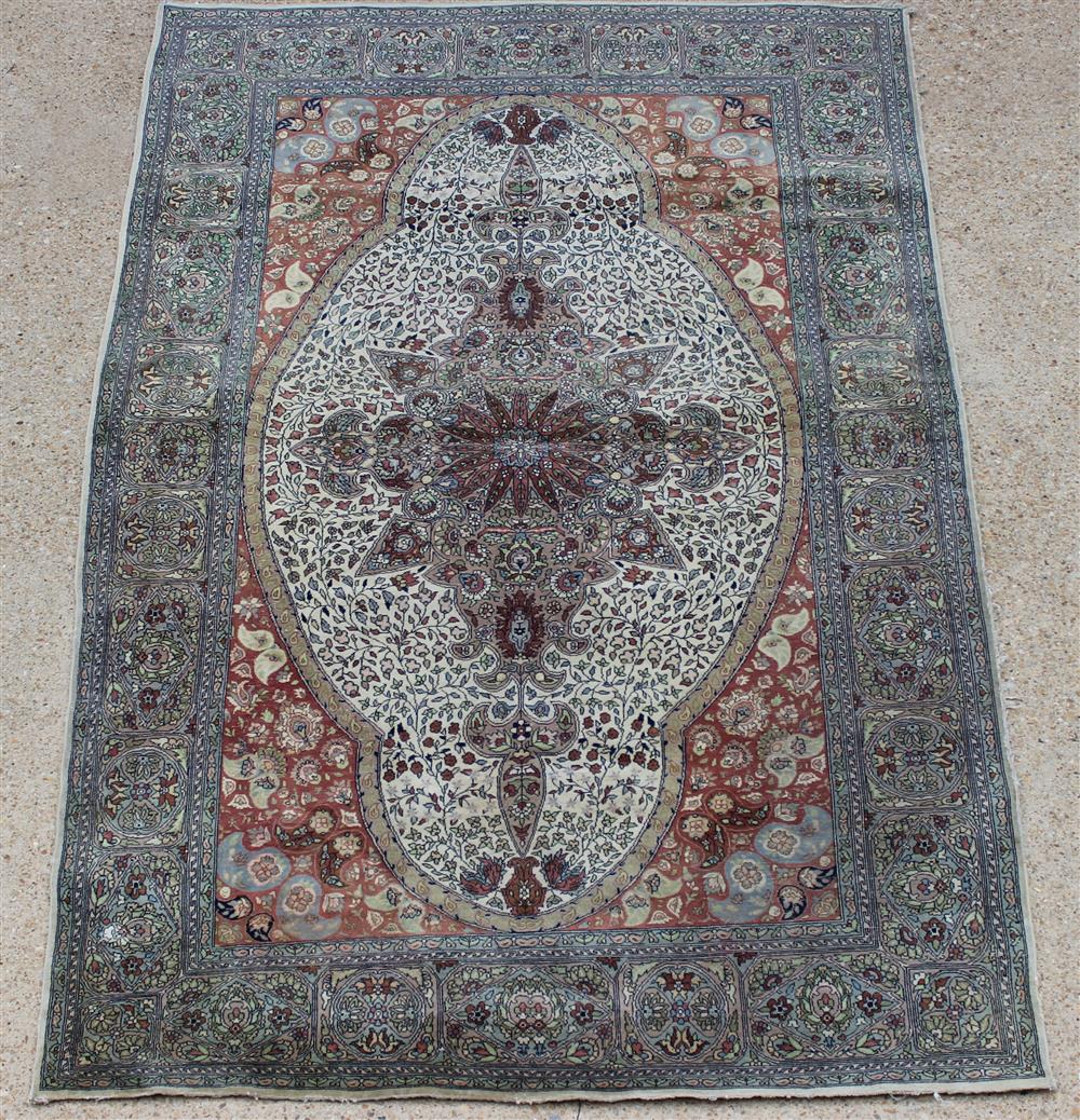 Appraisal: PERSIAN ISFAHAN WOOL RUG oval medallion with drops surrounded by