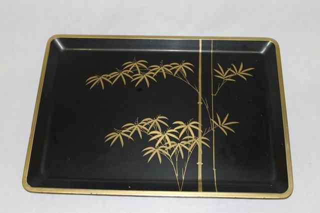 Appraisal: A JAPANESE BLACK LACQUER TRAY with gold maki-e bamboos