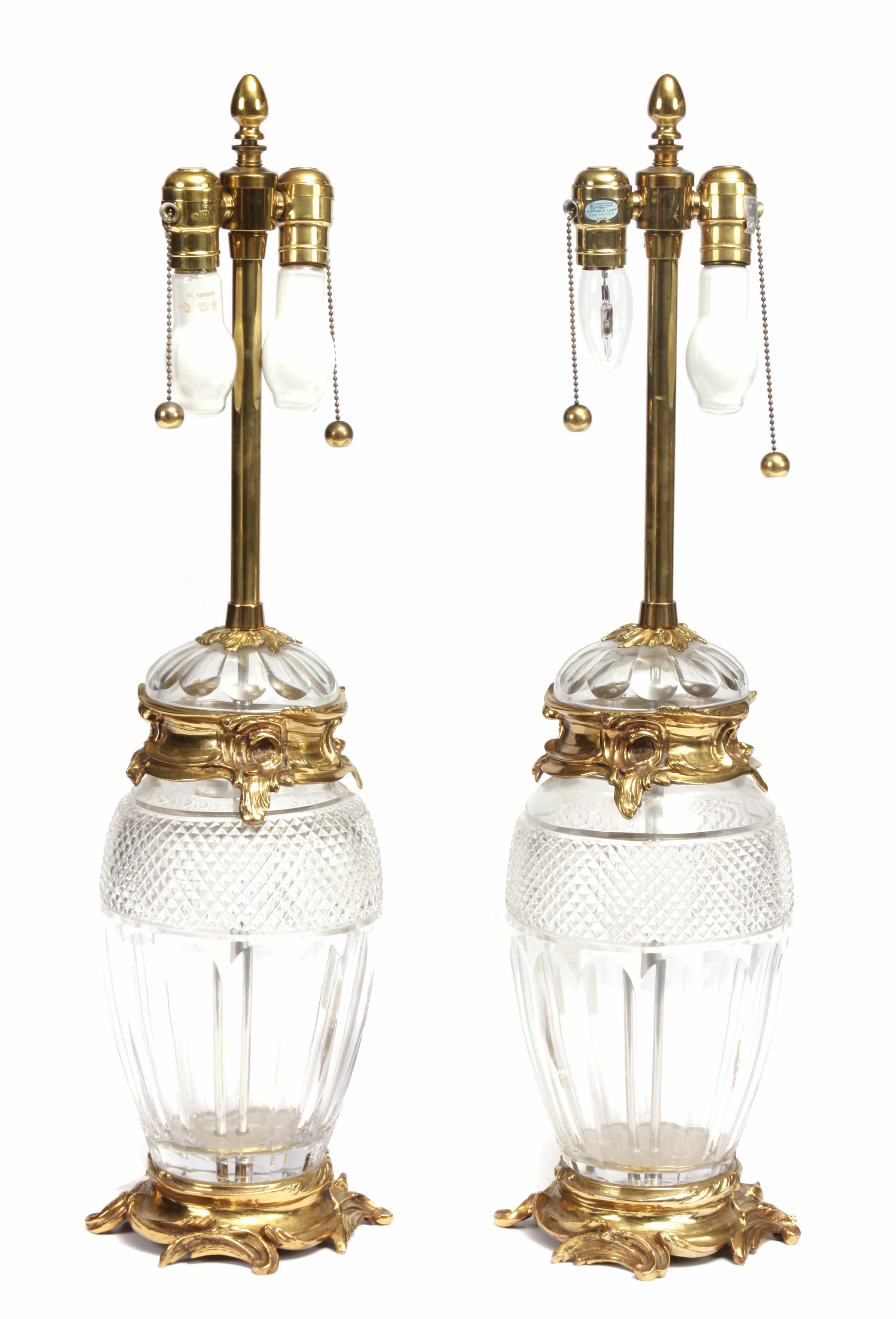 Appraisal: A pair of gilt bronze mounted glass table lamps overall