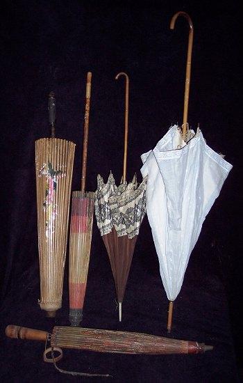 Appraisal: A lady's bamboo-handled parasol and sundry other parasols