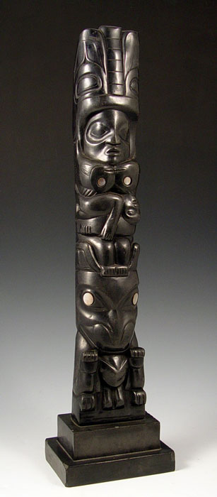 Appraisal: NORTHWEST FAUX ARGILLITE CARVED TOTEM Argillite appearance depicting figures with