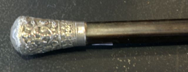 Appraisal: An Indian silver mounted ebony walking stick