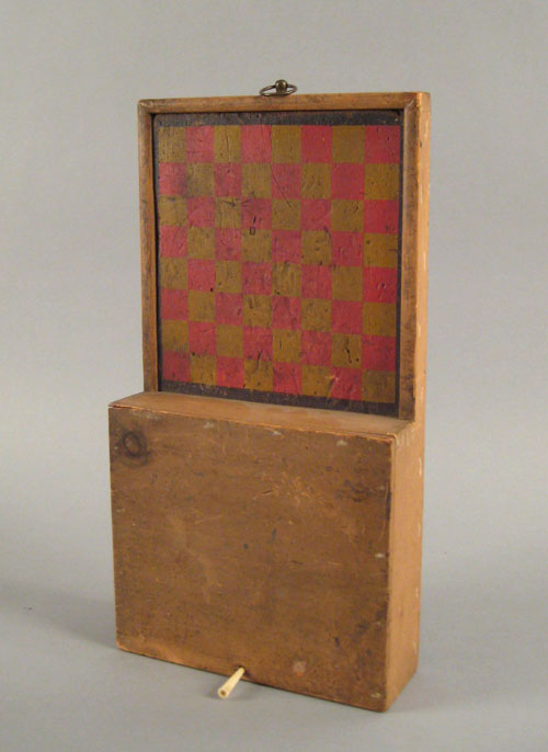 Appraisal: Painted pine gameboard th c with attached single drawer compartment